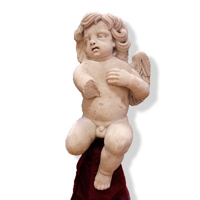 Marble sculpture depicting a putto. 