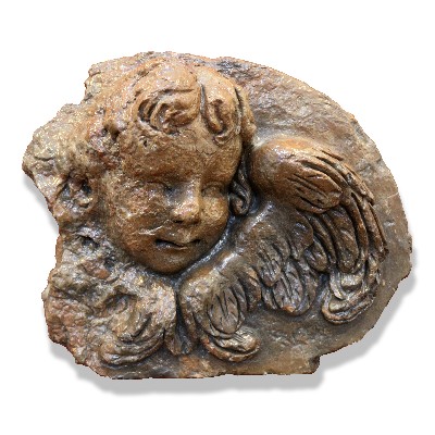 Winged cherub in Terracotta. 